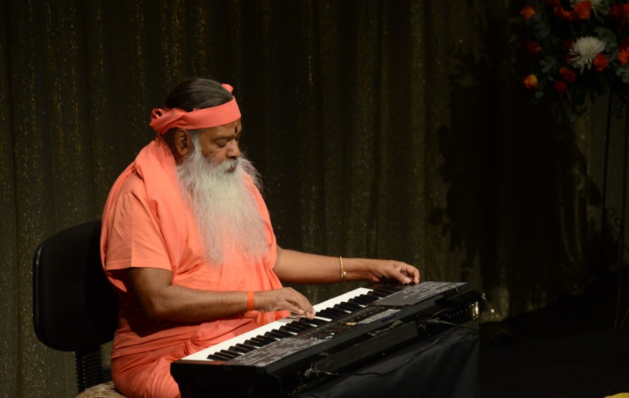 Sri Swamiji performing — concert stage