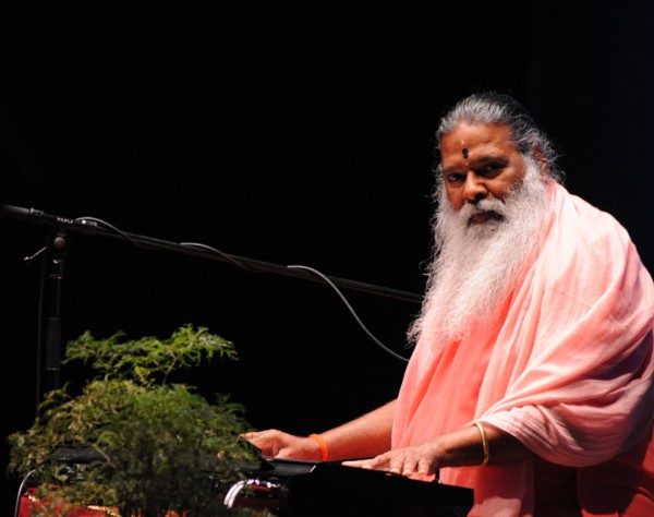 Sri Swamiji — solo portrait at keyboard
